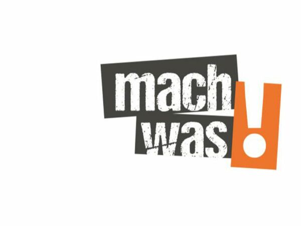 Logo "Mach was!" in grau und orage